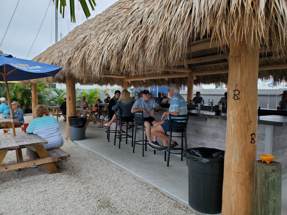 Riviera Bar and Grill.  Indoor dining just steps from your boat.  Outdoor dining under grass tiki hut. 